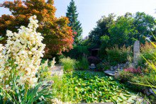  VERKAUFT ! WUNDERSCH�NE GARTENWOHNUNG MIT TRAUMGARTEN UND TEICH IN BESTLAGE HARLACHING - U-BAHN